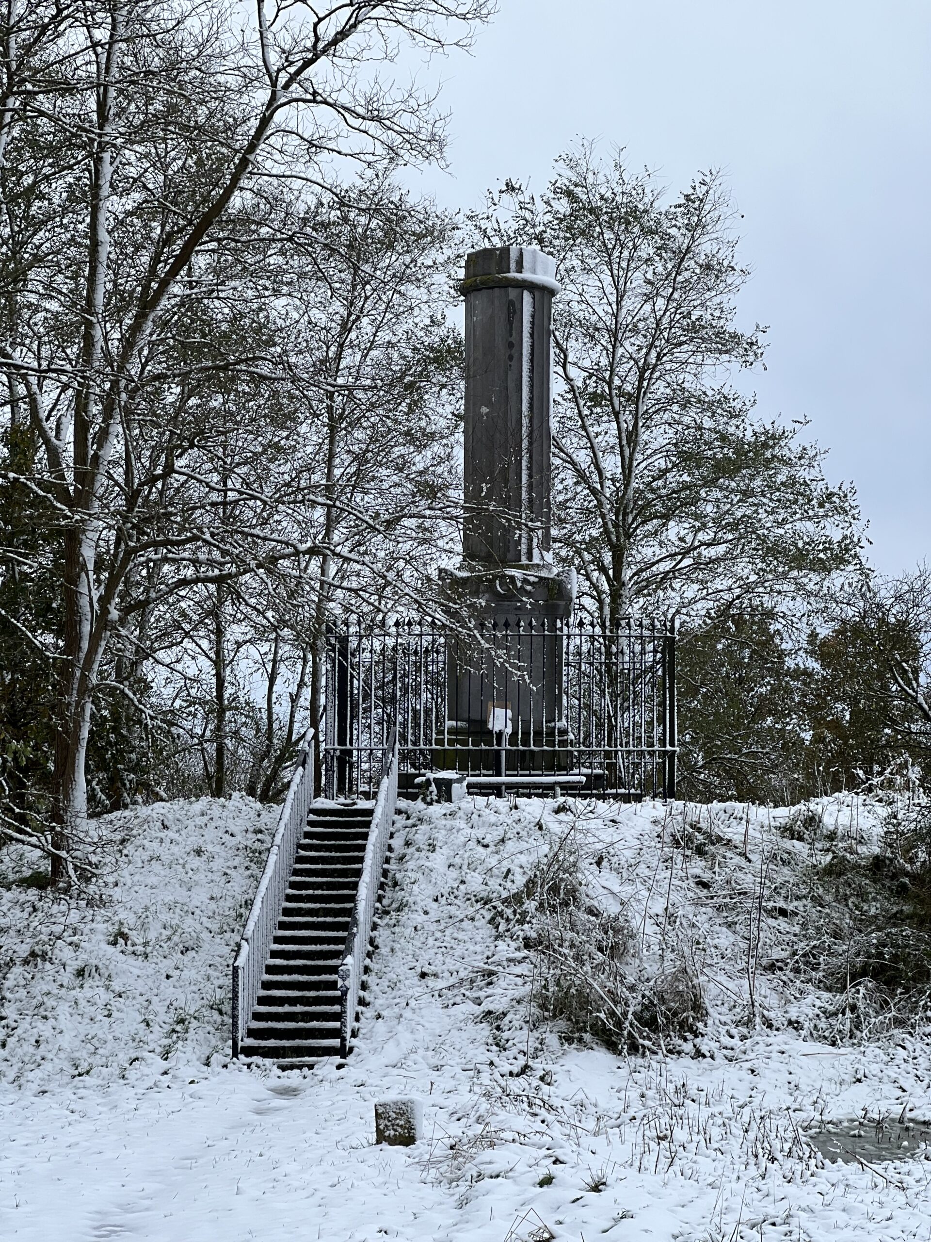 Memorial to the young Lt Colonel Alexander Gordon in the snow.